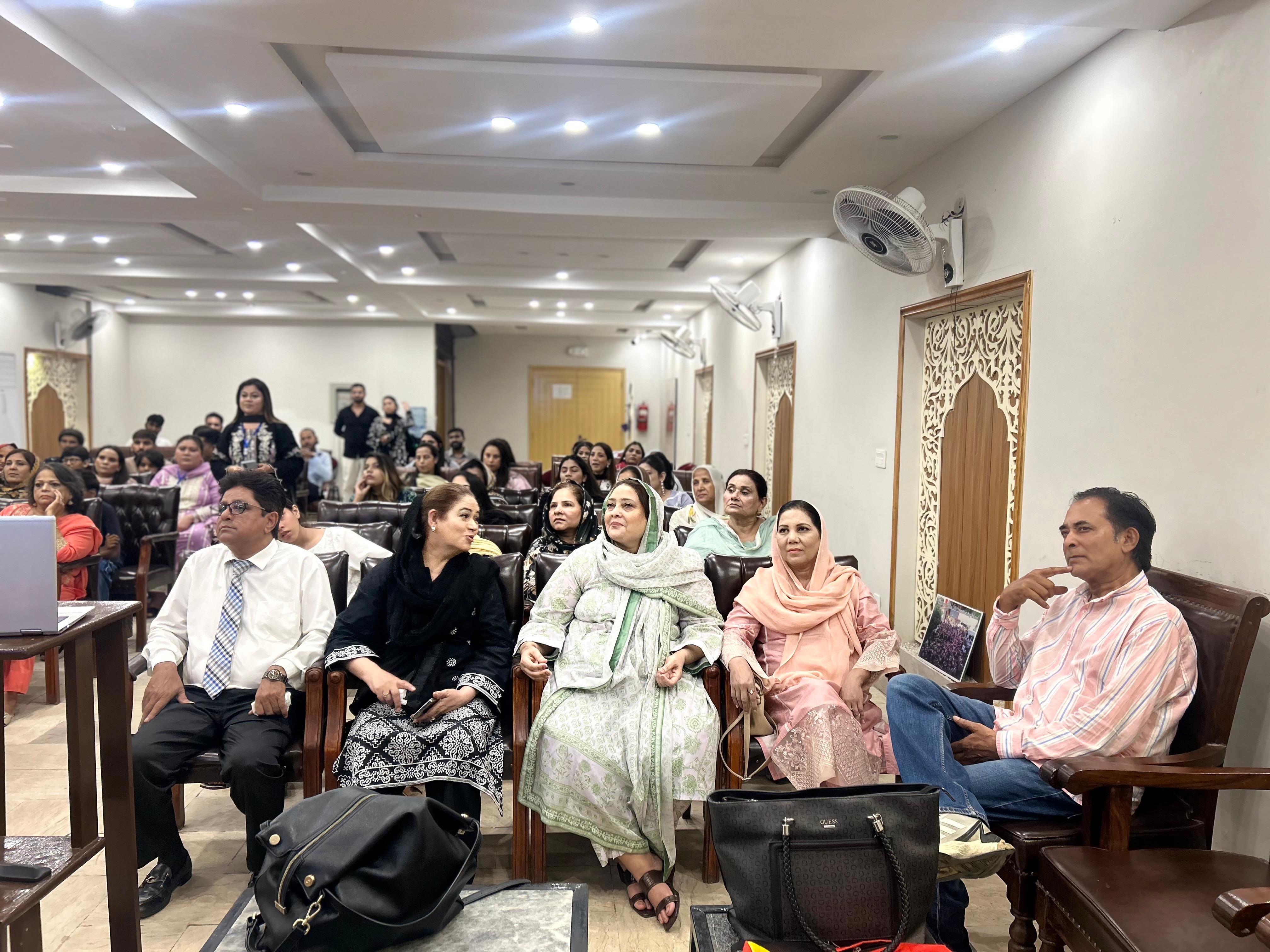 Students seated in rows during orientation at the Lahore Campus